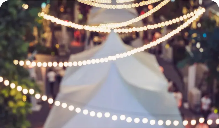 Fairy lights hanging over party venue